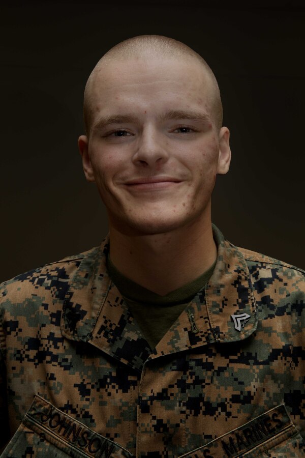 U.S. Marine Corps Cpl. Patrick Johnson poses for a photograph on Camp Kinser, Okinawa, Japan, August 13, 2019. Johnson, an ammunition clerk with G-4, Combat Logistics Regiment 37, 3rd Marine Logistics Group, is a native of Johnson City, Tennessee. (U.S. Marine Corps photo by Lance Cpl. Carla E. O)