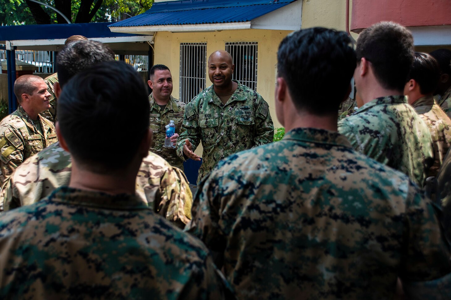 MANILA, Philippines (Aug. 19, 2019) Senior Chief Gunner's Mate Deonta Wade, assigned to Destroyer Squadron 7, speaks with participants during Southeast Asia Cooperation and Training (SEACAT) 2019 at the Philippine Coast Guard Headquarters in Manila. This year marks the 18th iteration of SEACAT, which is designed to enhance maritime security skills by highlighting the value of information sharing and multilateral coordination.
