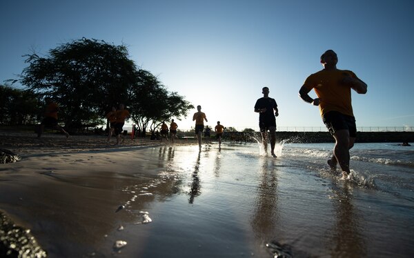 Silhouette of chief selectees running.