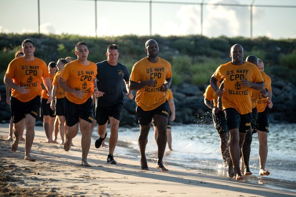 A group of chief selectees running.