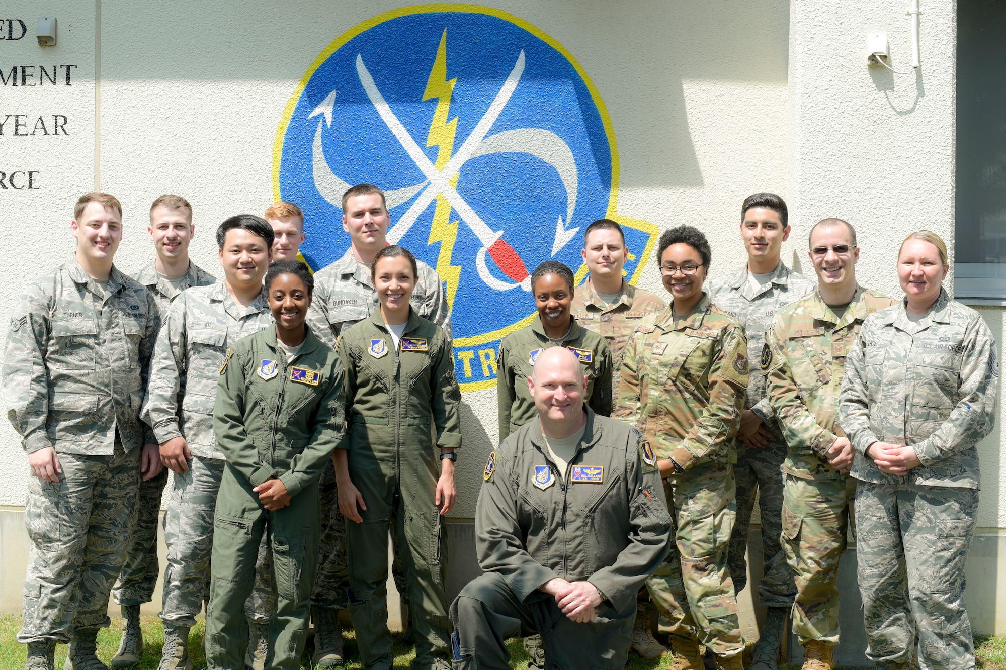 The U.S. Air Force 610th Air Control Flight pauses for a group photo at Misawa Air Base, Japan, July 31, 2019. The 610th ACF won two Headquarters Air Force-level awards in 2018 including the “Outstanding Ground-Based Battle Management Command and Control Crew.” Its mission ensured airspace safety for F-16 Fighting Falcon sorties by de-conflicting with multiple aircraft and providing pilots real-time feedback.