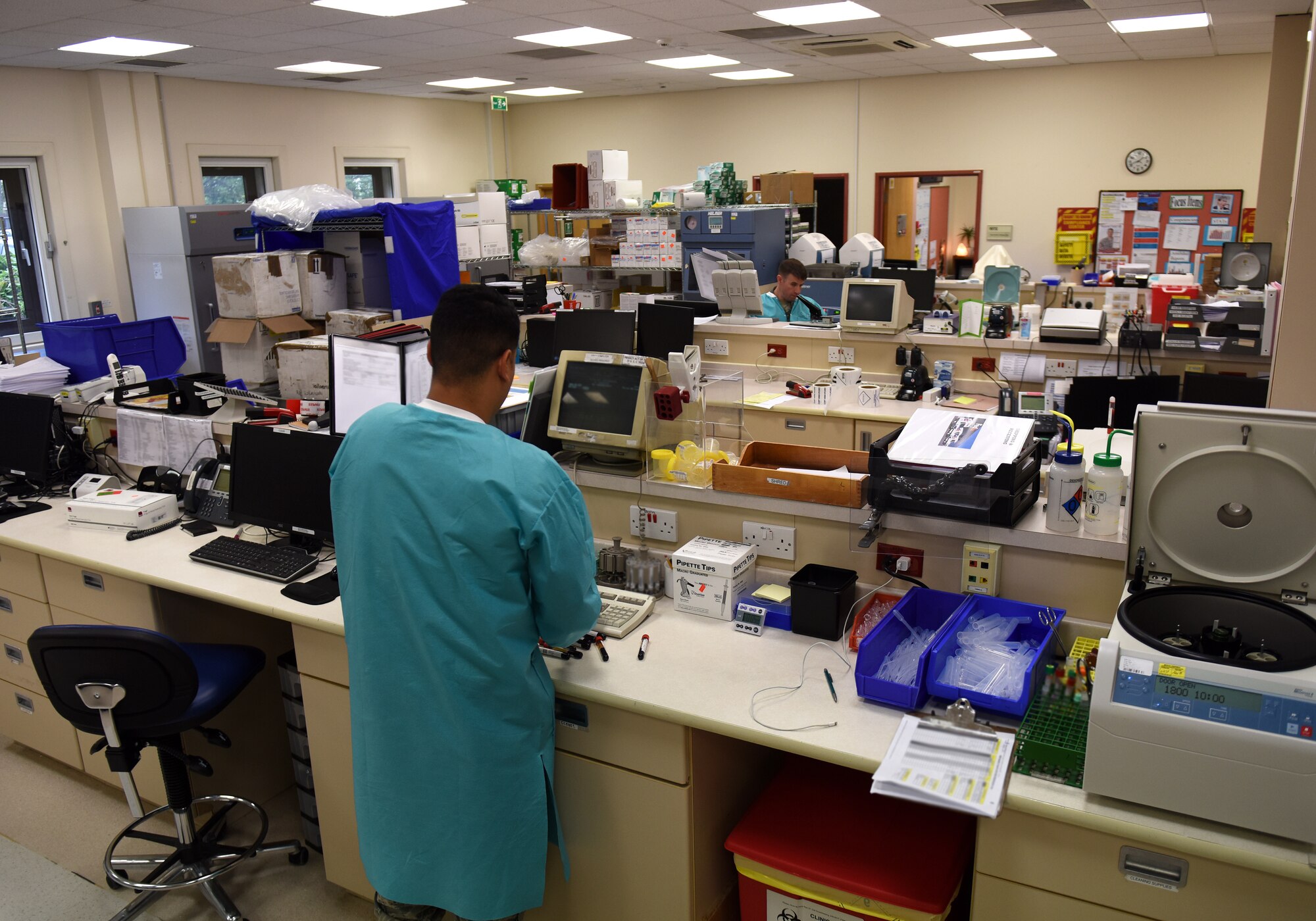 A 48th Medical Support Squadron laboratory technicians perform tests at Royal Air Force Lakenheath, England, Aug.14, 2019. Laboratory technicians provide accurate medical tests and appropriately diagnose illnesses to ensure the readiness of Liberty Wing Airmen. (U.S. Air Force photo by Airman 1st Class Madeline Herzog)