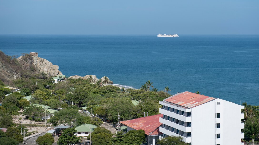The hospital ship USNS Comfort prepares to anchor.