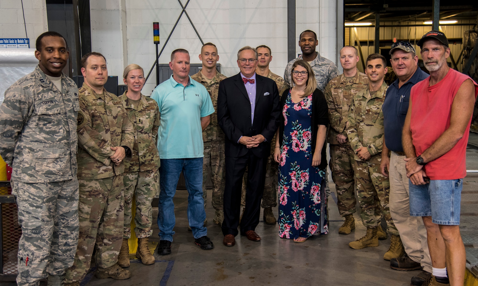 A group photo with part of the team involved in successfully transporting a torpedo to India August 16, 2019, at Dover Air Force Base, Del. The successful launch of the torpedo from the Indian submarine hunter marked the first time in the nation's history in which they had anti-submarine warfare proficiency. (US Air Force Photo by Airman 1st Class Jonathan Harding)