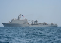 USN Sailors conduct maintenance on a Nigerian navy patrol boat