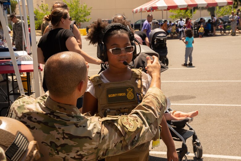 349th Air Mobility Wing Airmen and their family members participate in Operation Family Circle Aug. 10, 2019, at Travis Air Force Base, Calif.