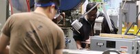 MAMRC Sailors and Civilians Clean and Prepare Lathes