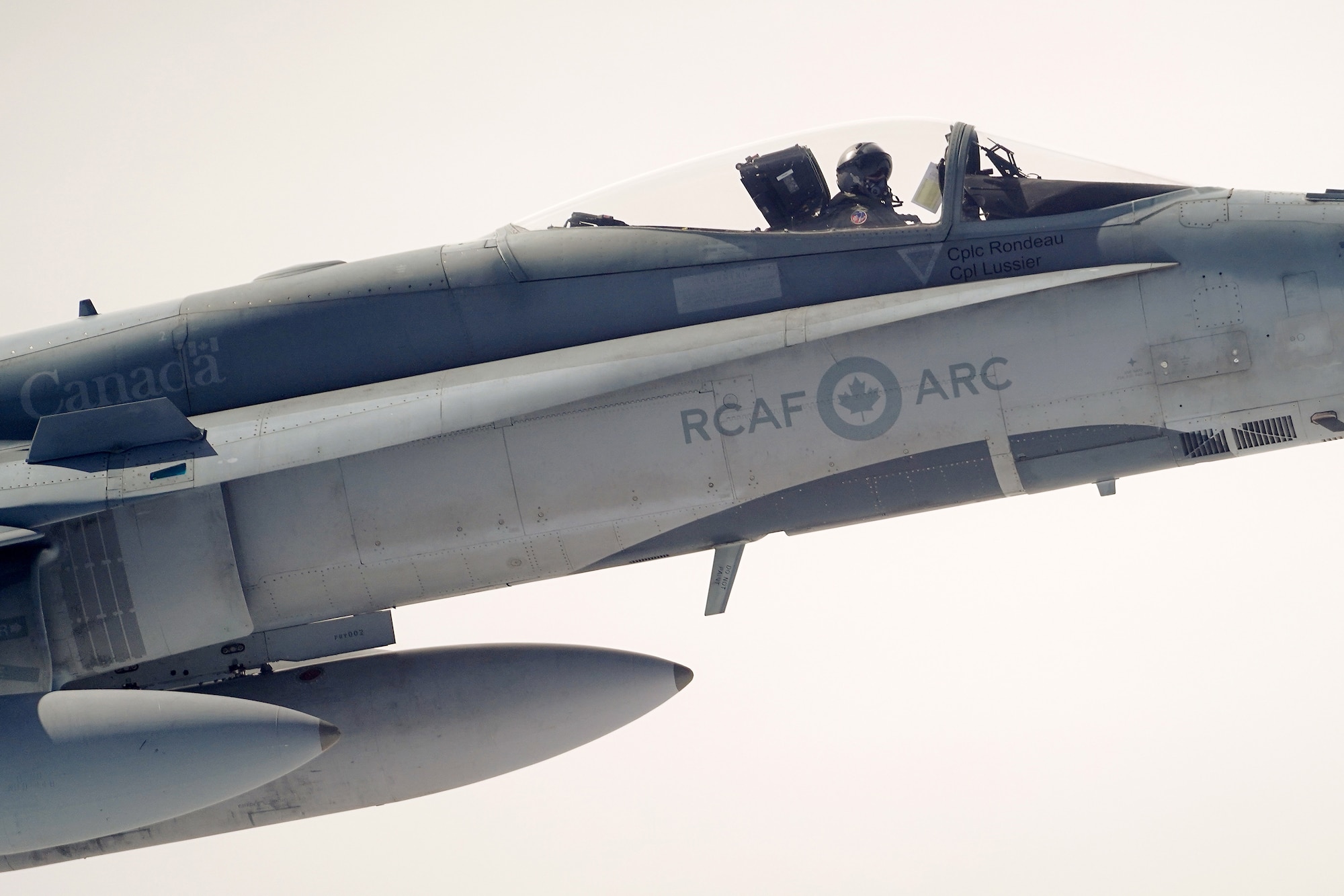 A Royal Canadian Air Force pilot in a CF-18 Hornet pull up to a CC-150 Polaris refueling tanker as RCAF Airmen assigned to the 437th Transport Squadron based out of Canadian Forces Base Trenton, Canada, perform refueling operations in training airspace over Alaska during the Red Flag-Alaska 19-3 exercise, Aug. 15, 2019. Red Flag-Alaska, a series of Pacific Air Forces commander-directed field training exercises for U.S. forces, provides joint offensive counter-air, interdiction, close air support, and large force employment training in a simulated combat environment.
