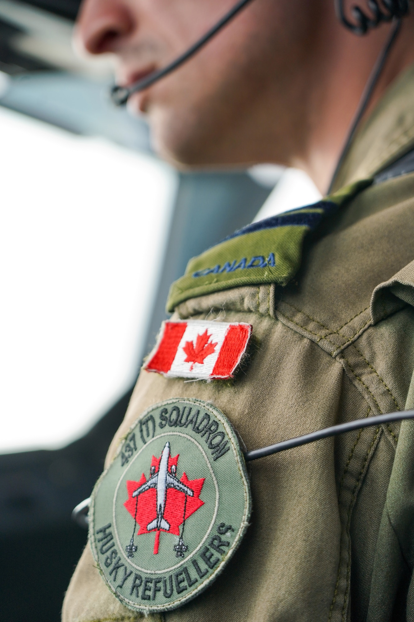 Royal Canadian Air Force pilot Capt. Russ Baker, assigned to the 437th Transport Squadron based out of Canadian Forces Base Trenton, Canada, looks out the cockpit windows of his crew’s CC-150 Polaris refueling tanker while performing refueling operations in training airspace over Alaska during the Red Flag-Alaska 19-3 exercise, Aug. 15, 2019. Red Flag-Alaska, a series of Pacific Air Forces commander-directed field training exercises for U.S. forces, provides joint offensive counter-air, interdiction, close air support, and large force employment training in a simulated combat environment.