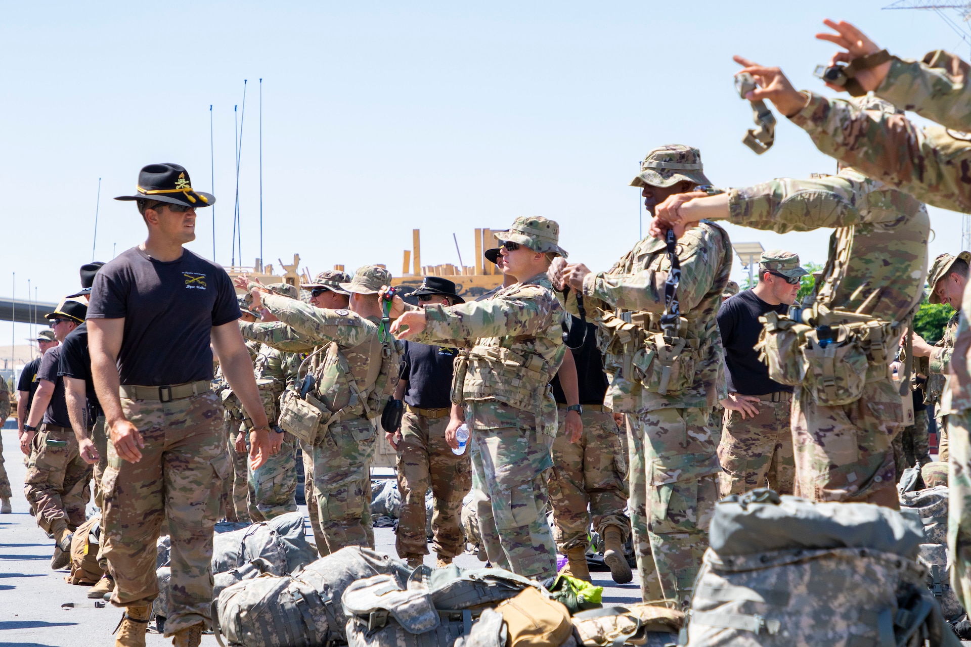 Spur candidates with 1st Squadron, 102nd Cavalry Regiment, 44th Infantry Brigade Combat Team of the 42nd Infantry Division, New Jersey National Guard, hold up red-lens lighting systems during a Spur Ride inventory inspection at Joint Training Center-Jordan August 10, 2019. The Army’s first priority is readiness - ensuring Soldiers have the tools and training needed to be lethal and ready to fight and win.