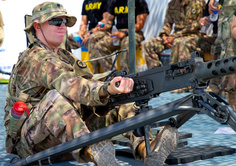 U.S. Army Spc. Jack Croft, Fords, N.J. native and spur candidate with 1st Squadron, 102nd Cavalry Regiment, 44th Infantry Brigade Combat Team of the 42nd Infantry Division, New Jersey National Guard, pulls the charging handle back on a .50-caliber machine gun for the scout’s gunnery test during a Spur Ride at Joint Training Center-Jordan August 10, 2019. The Army’s first priority is readiness - ensuring Soldiers have the tools and training needed to be lethal and ready to fight and win.