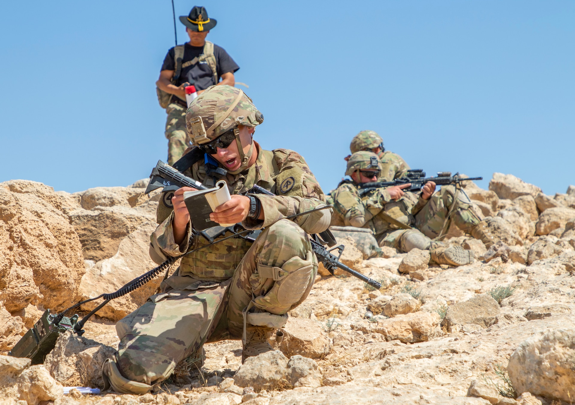 Spur candidates with 1st Squadron, 102nd Cavalry Regiment, 44th Infantry Brigade Combat Team of the 42nd Infantry Division, New Jersey National Guard, call for fire while being evaluated by a Spur Holder on their teamwork, radio communication capabilities and the elements of call for fire during a Spur Ride at Joint Training Center-Jordan August 11, 2019. The Army’s first priority is readiness - ensuring Soldiers have the tools and training needed to be lethal and ready to fight and win.