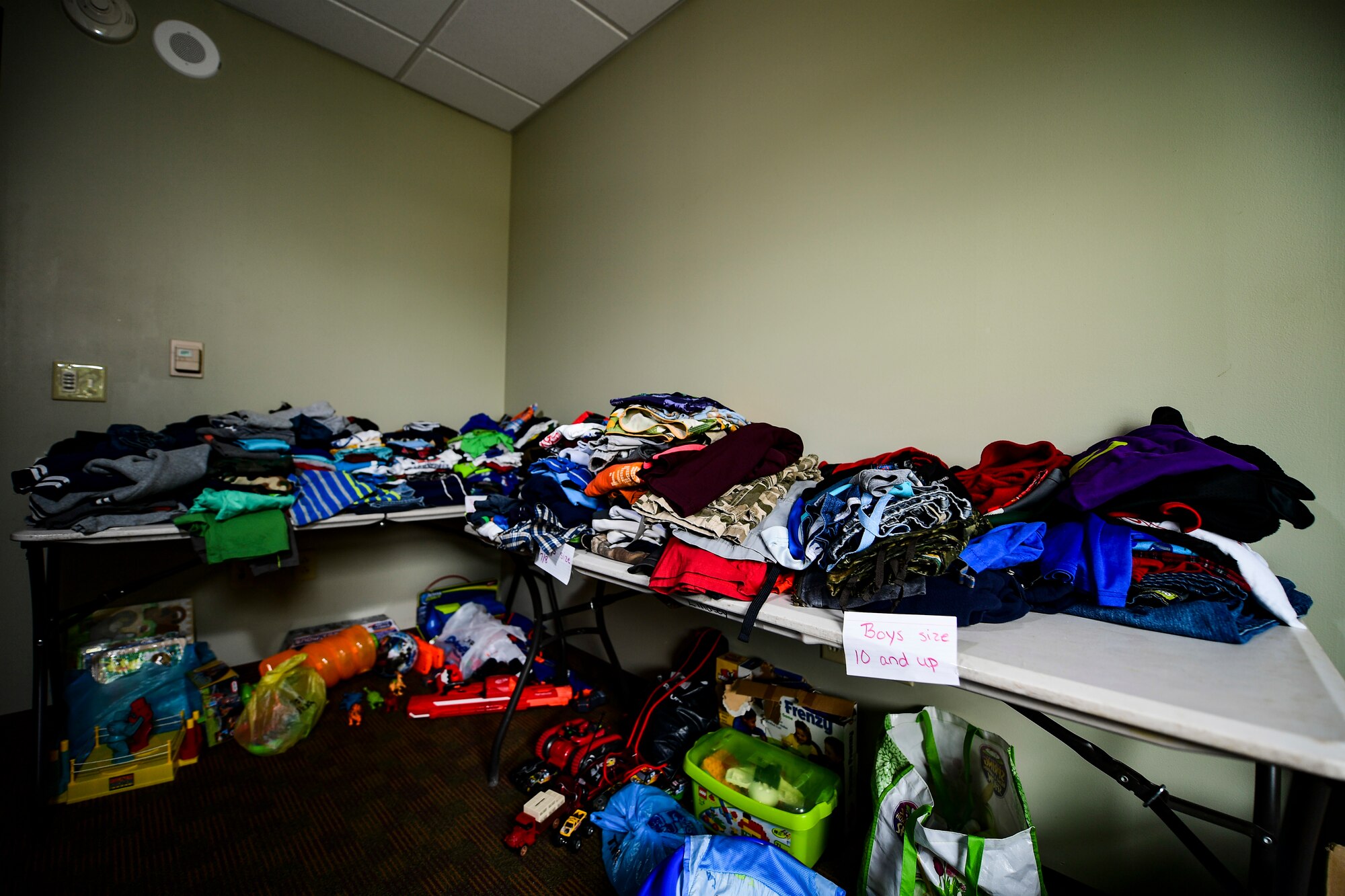 Toys and clothes sit in the 911th Airlift Wing's Airmen's Attic at the Pittsburgh International Airport Air Reserve Station, Pennsylvania, August 20, 2019. The 911th AW's Airmen's Attic, located on the third floor of building 209, is a place for all enlisted, officers, retirees and their families to donate and received gently used goods at no cost.