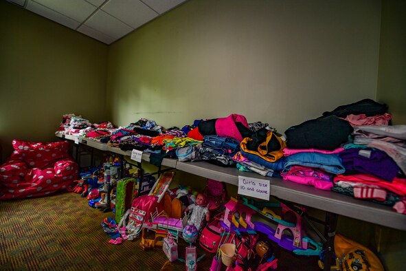 Toys and clothes sit in the 911th Airlift Wing's Airmen's Attic at the Pittsburgh International Airport Air Reserve Station, Pennsylvania, August 20, 2019. The 911th AW's Airmen's Attic, located on the third floor of building 209, is a place for all enlisted, officers, retirees and their families to donate and received gently used goods at no cost.