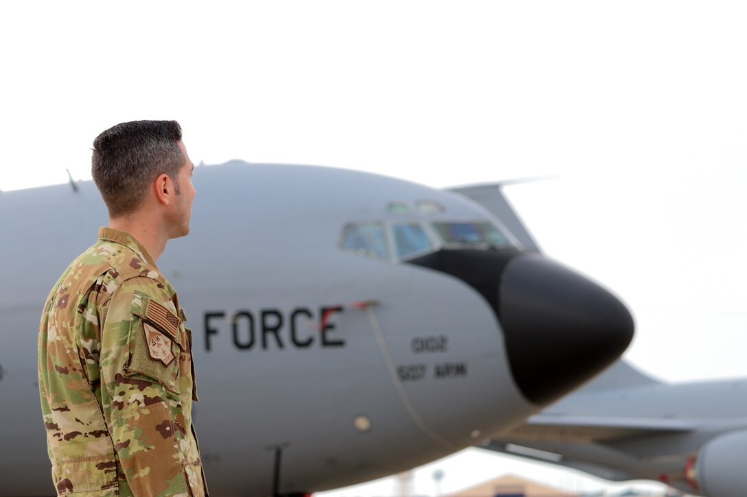 Master Sgt. Ryan Cornell, 465th Air Refueling Squadron boom operator, stands by a 507th Air Refueling Wing KC-135R Stratotanker, Aug. 13, 2019, at Tinker Air Force Base, Oklahoma. The Air Force Recruiting Service was there to film Cornell to highlight enlisted aircrew career fields. (U.S. Air Force photo by Senior Airman Mary Begy)