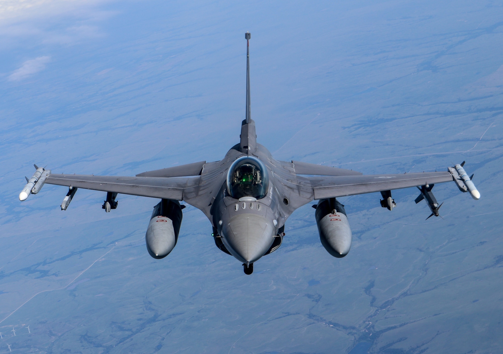 A 138th Fighter Wing F-16 Fighting Falcon flies behind a 507th Air Refueling Wing KC-135R Statotanker during a congressional orientation flight, Aug. 15, 2019, at Tinker Air Force Base, Oklahoma. The Okies shared the Reserve mission and a unique experience with the congressional delegation. (U.S. Air Force photo by Senior Airman Mary Begy)