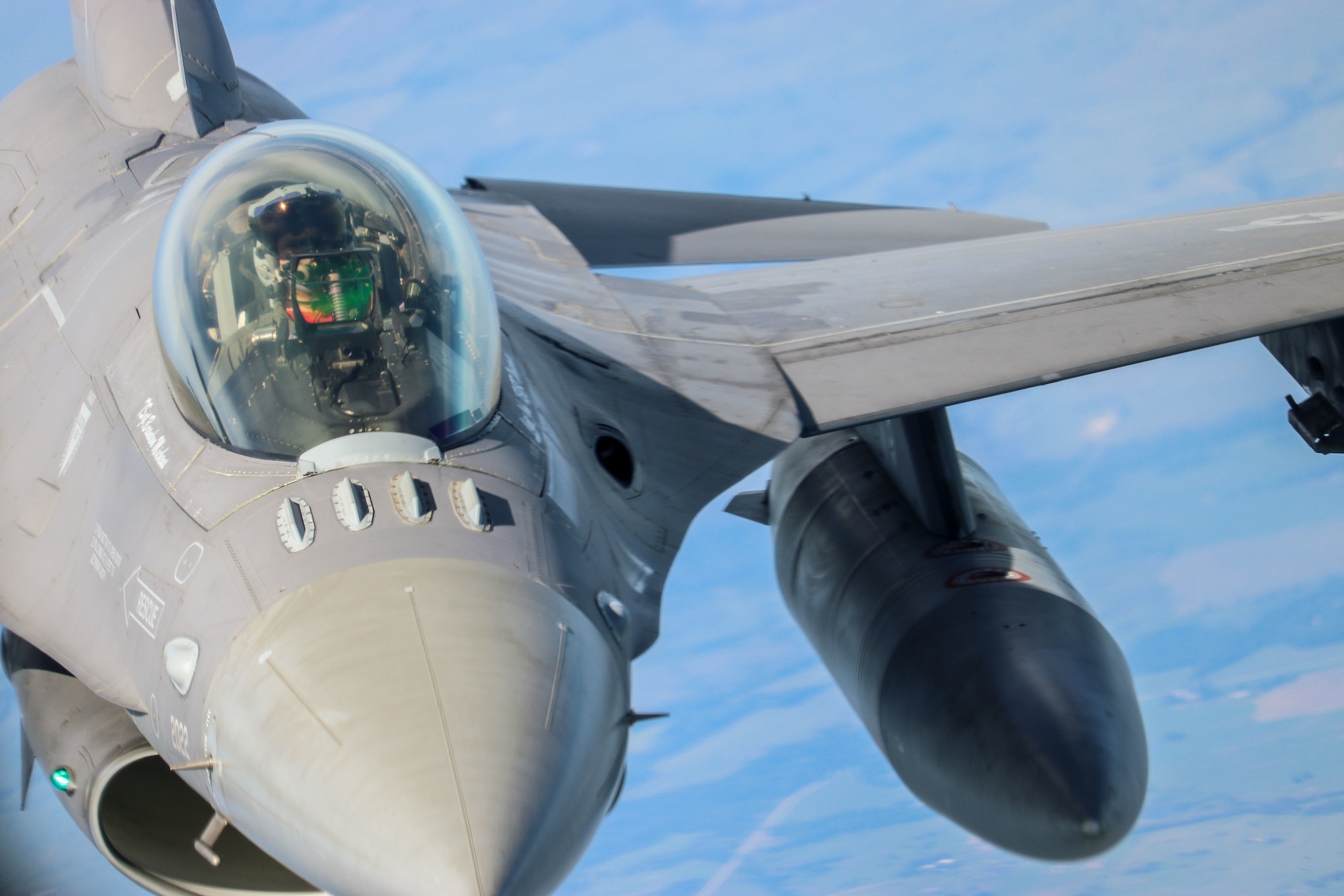 A 138th Fighter Wing F-16 Fighting Falcon flies behind a 507th Air Refueling Wing KC-135R Statotanker during a congressional orientation flight, Aug. 15, 2019, at Tinker Air Force Base, Oklahoma. The Okies shared the Reserve mission and a unique experience with the congressional delegation. (U.S. Air Force photo by Senior Airman Mary Begy)