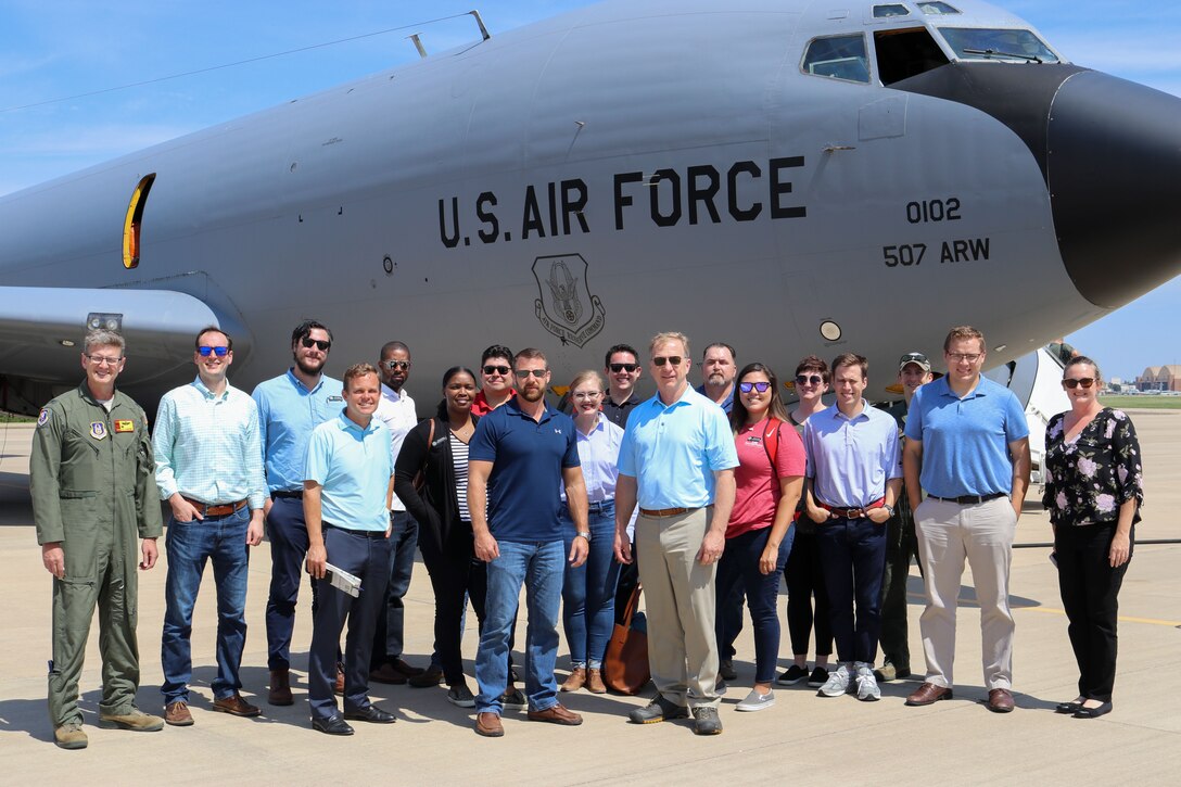 Congressmen and their staff stand for a group photo after a congressional orientation flight on a 507th Air Refueling Wing KC-135R Stratotanker Aug. 15, 2019, at Tinker Air Force Base, Oklahoma. The Okies shared the Reserve mission and a unique experience with the congressional delegation. (U.S. Air Force photo by Senior Airman Mary Begy)