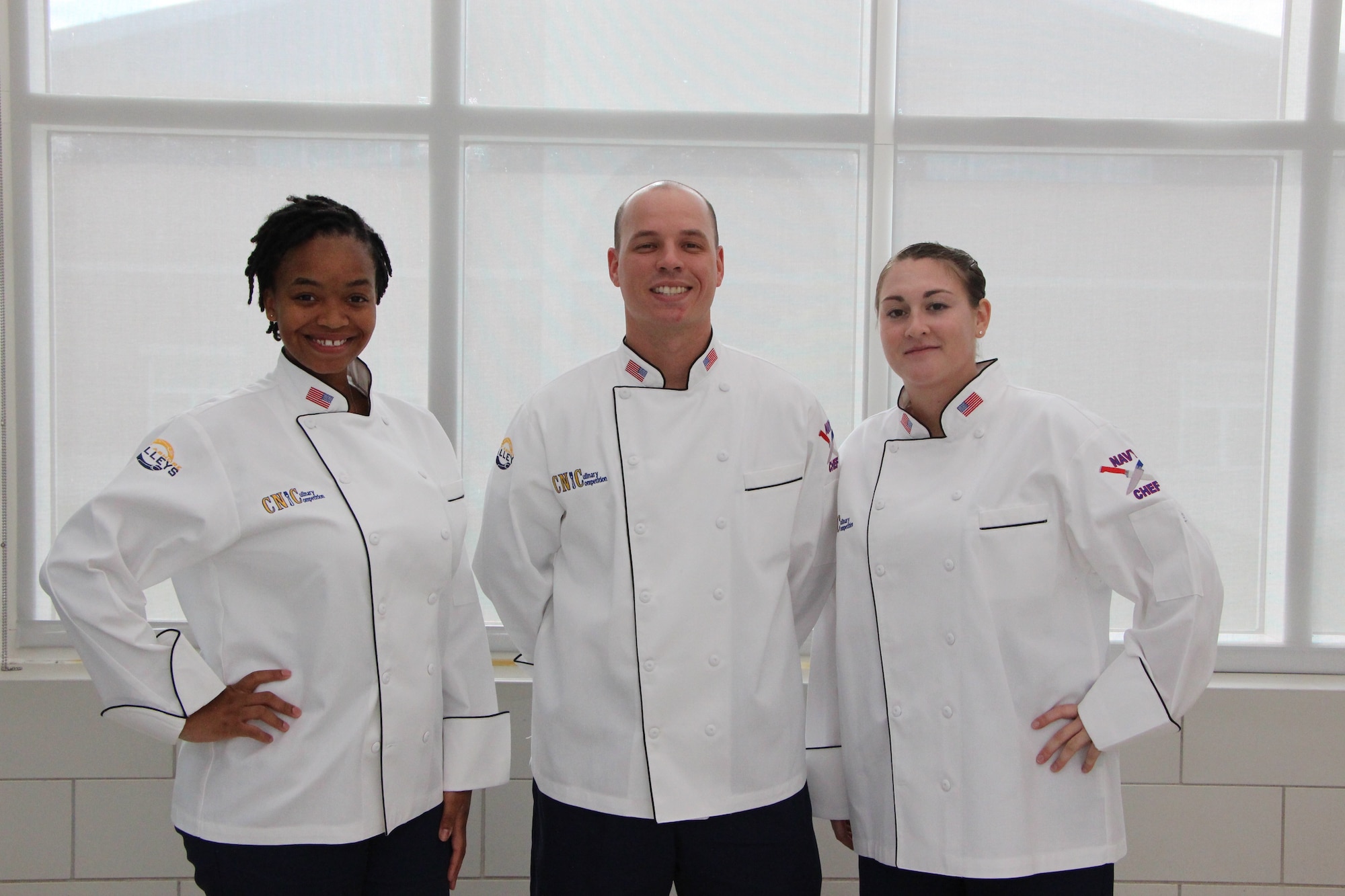 Staff Sgt. Cherise Hood (left), Staff Sgt. Joshua Parnell (middle) and Senior Airman Alyssa Ross (right), assigned to the 36th Force Support Squadron, represented Joint Region Marianas at the Tenth Annual Commander, Navy Installations Command (CNIC) Culinary Competition July 25, 2019 at Naval Station Great Lakes, Ill.