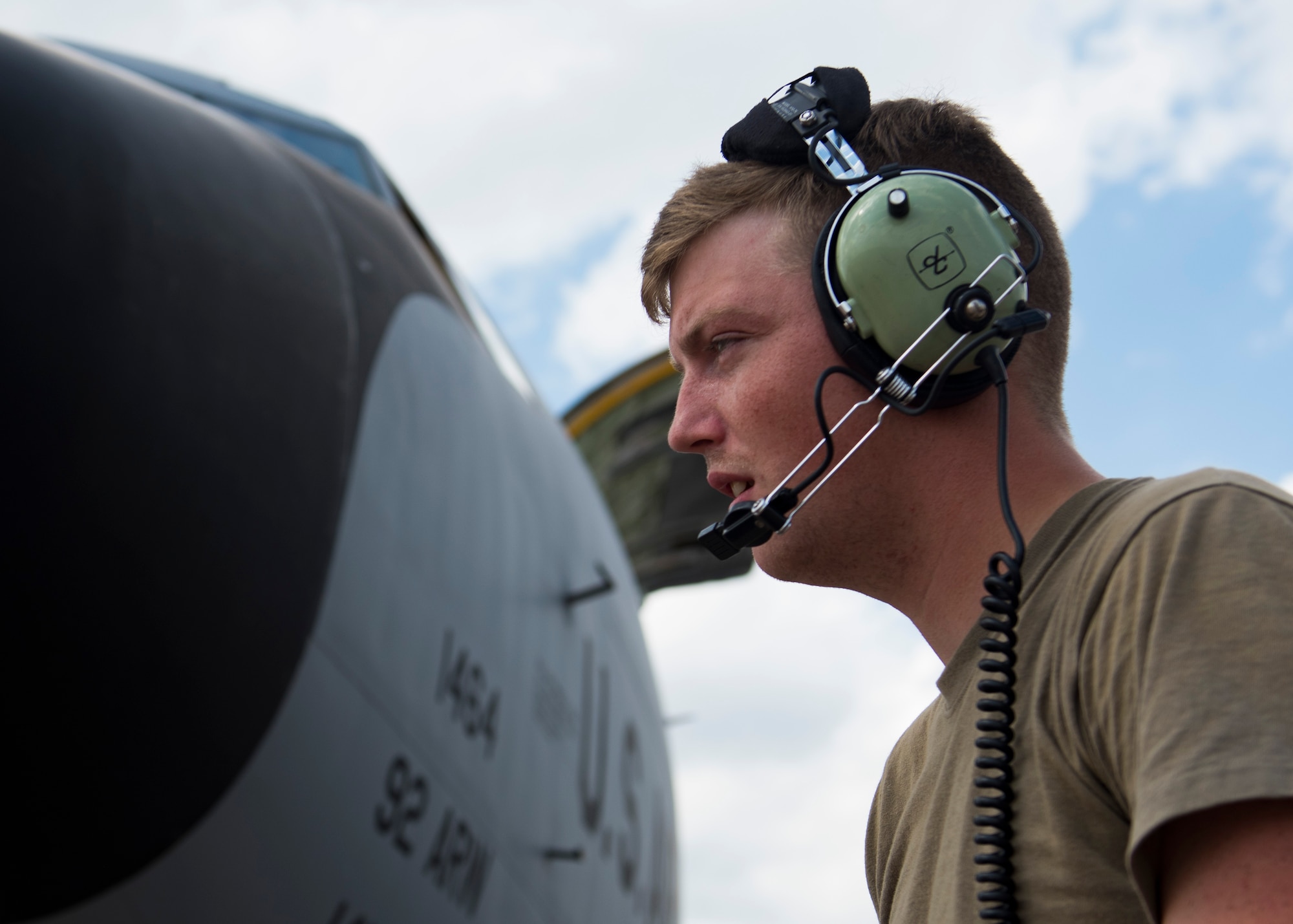 U.S. Air Force Senior Airman Zachery Murray, 92nd Aircraft Maintenance Squadron flying crew chief, communicates with aircrew during pre-flight checks on a KC-135 Stratrotanker at Dyess Air Force Base, Texas, Aug. 13, 2019.