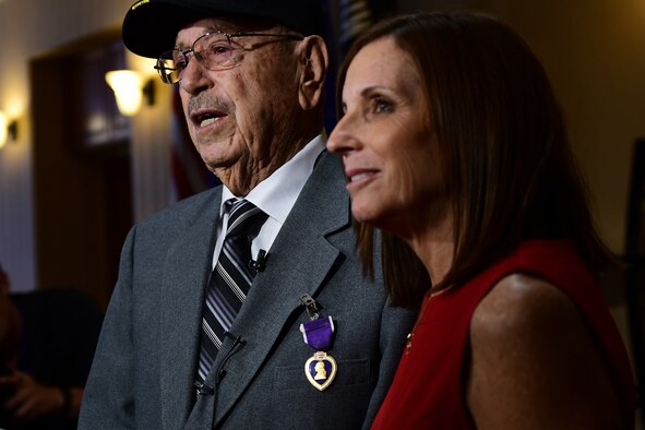 Walter Ram, a World War II veteran, was presented the Purple Heart Medal by U.S. Senator Martha McSally during a World War II Purple Heart Presentation Ceremony held at Davis-Monthan Air Force Base, Arizona, Aug. 20, 2019. The Purple Heart Medal is awarded to service members who have been wounded or killed as a result of enemy action while serving in the U.S. military. (U.S. Air Force photo by Airman 1st Class Kristine Legate)