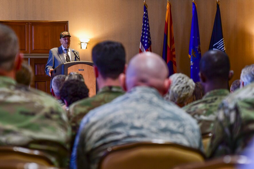 Walter Ram, a World War II veteran, was presented the Purple Heart Medal by U.S. Senator Martha McSally during a World War II Purple Heart Presentation Ceremony held at Davis-Monthan Air Force Base, Arizona, Aug. 20, 2019. During the ceremony, Ram shared his experiences in the military and as a prisoner of war. (U.S. Air Force photo by Airman 1st Class Kristine Legate)