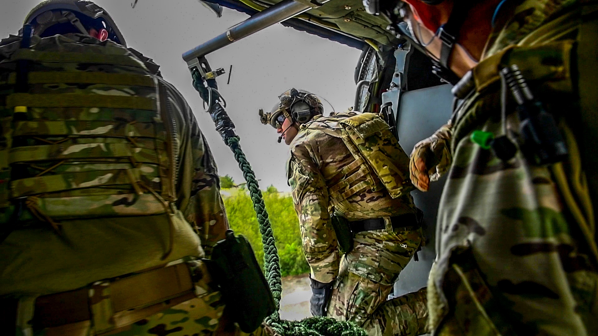 190819-N-TP834-1119
SANTA RITA, Guam (Aug. 19, 2019) Sailors assigned to Explosive Ordnance Disposal Unit (EODMU) 5 monitor the drop zone from an MH-60S Seahawk helicopter, attached to the Island Knights of Helicopter Sea Combat Squadron (HSC) 25, during a fast-roping evolution during Exercise Hydracrab. Hydracrab is quadrilateral exercise conducted by forces from Australia, Canada, New Zealand and U.S. Naval forces. The purpose of this exercise is to prepare the participating Explosive Ordnance Disposal (EOD) forces to operate as an integrated, capable and potent allied force ready to respond to a changing and complex maritime environment in the Indo-Pacific region. (U.S. Navy photo by Mass Communication Specialist 1st Class John Philip Wagner Jr./Released)