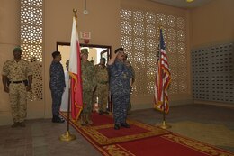 190818-N-IO414-1028 MANAMA, Bahrain (Aug 19, 2019) His Majesty, King Hamad bin Isa Al Khalifa, the King of the Kingdom of Bahrain, and Vice Adm. James Malloy, Naval Forces Central Command (NAVCENT) enters U.S. Naval Forces Central Command headquarters, during a visit to discuss operations in the U.S. 5th Fleet area of operations. The King was accompanied by two of his sons, His Highness Maj. Gen. Shaikh Nasser bin Hamad Al-Khalifa, commander of the Bahraini Royal Guard, and His Highness Lt. Col. Shaikh Khaled bin Hamad Al Khalifa, commander of the Bahraini Royal Guard Rapid Intervention Force along with other top Bahraini military leaders. Bahrain has been a partner with the United States in regional maritime security for more than 70 years. (U.S. Navy photo by Mass Communication Specialist 2nd Class Jordan Crouch/Released)