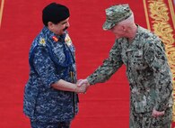 190819-N-KZ419-1068 MANAMA, Bahrain (Aug. 19, 2019) His Majesty, King Hamad bin Isa Al Khalifa, the King of the Kingdom of Bahrain, left, and Vice Adm. Jim Malloy, commander of U.S. Naval Forces Central Command, U.S. 5th Fleet, right, shake hands during a visit to discuss operations in the U.S. 5th Fleet area of operations. The King was accompanied by two of his sons, His Highness Maj. Gen. Shaikh Nasser bin Hamad Al-Khalifa, commander of the Bahraini Royal Guard, and His Highness Lt. Col. Shaikh Khaled bin Hamad Al Khalifa, commander of the Bahraini Royal Guard Rapid Intervention Force along with other top Bahraini military leaders. Bahrain has been a partner with the United States in regional maritime security for more than 70 years. (U.S. Navy photo by Mass Communication Specialist 3rd Class Dawson Roth/Released)
