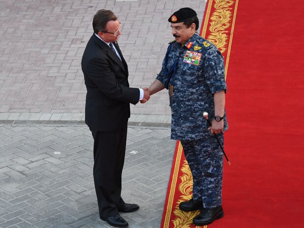 190819-N-KZ419-1077 MANAMA, Bahrain (Aug. 19, 2019) His Majesty, King Hamad bin Isa Al Khalifa, the King of the Kingdom of Bahrain, right, and the U.S. Ambassador to the Kingdom of Bahrain, the honorable Justin Siberell, shake hands during a visit to discuss operations in the U.S. 5th Fleet area of operations. The King was accompanied by two of his sons, His Highness Maj. Gen. Shaikh Nasser bin Hamad Al-Khalifa, commander of the Bahraini Royal Guard, and His Highness Lt. Col. Shaikh Khaled bin Hamad Al Khalifa, commander of the Bahraini Royal Guard Rapid Intervention Force along with other top Bahraini military leaders. Bahrain has been a partner with the United States in regional maritime security for more than 70 years. (U.S. Navy photo by Mass Communication Specialist 3rd Class Dawson Roth/Released)