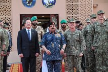 190819-N-KZ419-1051 MANAMA, Bahrain (Aug. 19, 2019) His Majesty, King Hamad bin Isa Al Khalifa, the King of the Kingdom of Bahrain, center, Vice Adm. Jim Malloy, commander of U.S. Naval Forces Central Command, U.S. 5th Fleet, right, and the U.S. Ambassador to the Kingdom of Bahrain, the honorable Justin Siberell, pose for a photo during a visit to discuss operations in the U.S. 5th Fleet area of operations. The King was accompanied by two of his sons, His Highness Maj. Gen. Shaikh Nasser bin Hamad Al-Khalifa, commander of the Bahraini Royal Guard, and His Highness Lt. Col. Shaikh Khaled bin Hamad Al Khalifa, commander of the Bahraini Royal Guard Rapid Intervention Force along with other top Bahraini military leaders. Bahrain has been a partner with the United States in regional maritime security for more than 70 years. (U.S. Navy photo by Mass Communication Specialist 3rd Class Dawson Roth/Released)