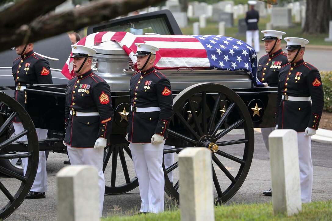 Marine Corps Body Bearers, Bravo Company, Marine Barracks Washington, D.C., stand at attention during a full honors funeral for Maj. Matthew M. Wiegand at Arlington National Cemetery, Arlington, Virginia, Aug. 15, 2019. Wiegand, an Ambler, Pennsylvania native, commissioned as a second lieutenant in 2008 and served 11 faithful years as a pilot and flight instructor. Wiegand passed away on March 30, 2019 during a night training accident. (U.S. Marine Corps photo by Sgt. Robert Knapp/Released)