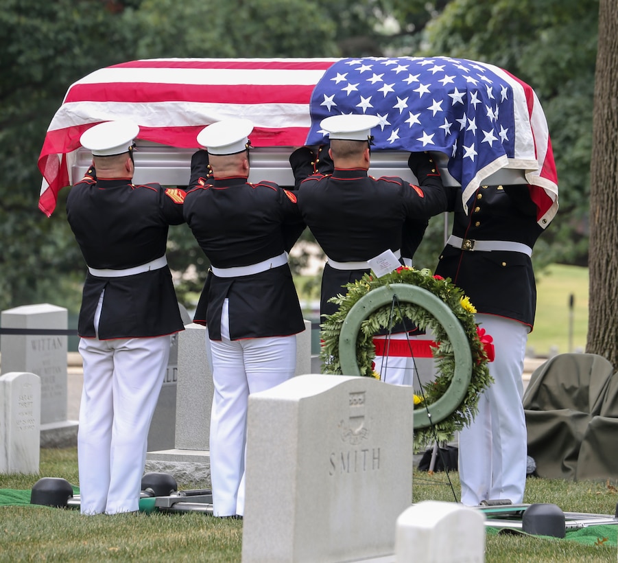 Marine Corps Body Bearers, Bravo Company, Marine Barracks Washington, D.C., conduct the final raise of the casket of Maj. Matthew M. Wiegand during a full honors funeral for Wiegand at Arlington National Cemetery, Arlington, Virginia, Aug. 15, 2019. Wiegand, an Ambler, Pennsylvania native, commissioned as a second lieutenant in 2008 and served 11 faithful years as a pilot and flight instructor. Wiegand passed away on March 30, 2019 during a night training accident. (U.S. Marine Corps photo by Sgt. Robert Knapp/Released)