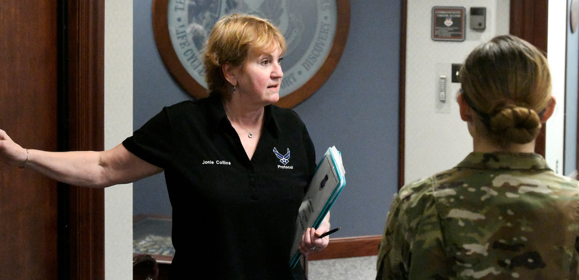 Jonie Collins discusses tactics and protocol with Airmen at Wright-Patterson Air Force Base, August 13 2019.  (U.S. Air Force photo / Darrius A. Parker)