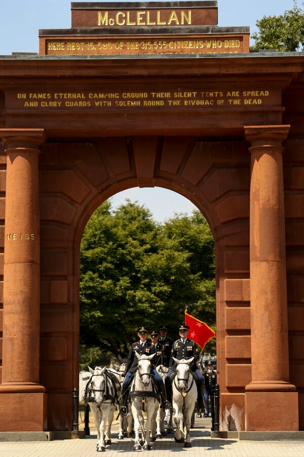 U.S. Army Soldiers with the Caisson Platoon, 1st Battalion, 3rd U.S. Infantry Regiment, pull the Caisson through Arlington Nation Cemetery during a full honors funeral for Maj. Gen. Ronald L. Beckwith in Arlington, Virginia, Aug. 7, 2019. Beckwith commissioned as a second lieutenant in the Marine Corps in 1957 and served several combat tours in Vietnam as a combat aviator. Beckwith retired from the Marine Corps in 1991 after 34 years of service and passed away on Feb. 19, 2019. (U.S. Marine Corps photo by Pfc Allen Sanders)