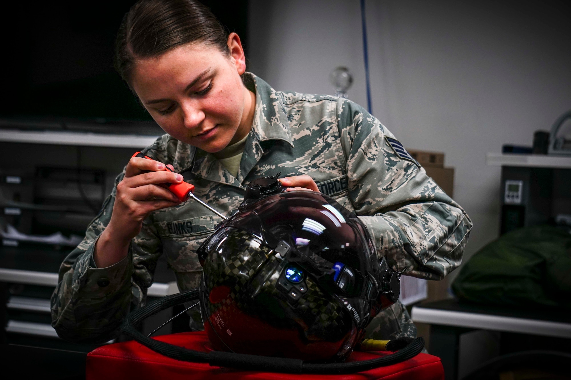 Staff Sgt. Rachel Blanks, aircrew flight equipment craftsman in the 419th Operations Support Flight, performs a 30-day inspection on an F-35 helmet