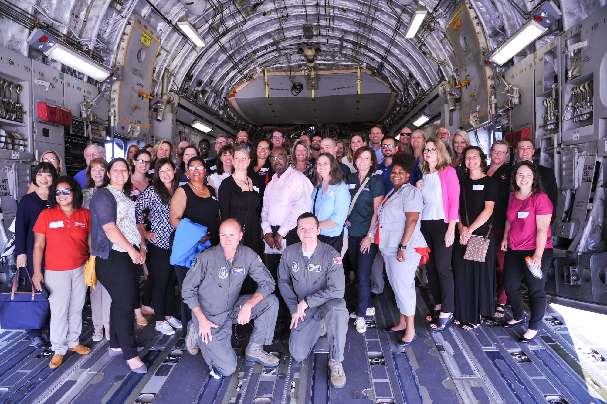 Guests from the Miami Valley Higher Education Consortium took a look inside one of the 445th Airlift Wing's C-17 aircraft. The plane visit was part of an all day tour that took place August 6. (U.S. Air Force photo/Pamela Piccoli)