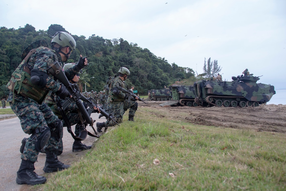 Marines train on the beach.