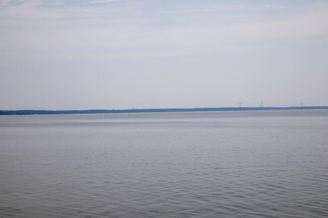 This photo is a view of the Skiffes Creek power lines from the Colonial Parkway at  37°13'10.75"N;  76°41'55.54"W. A 70mm focal length was used, as this best matched up what the human eye was seeing and what was being viewed through the viewfinder of a full frame camera.