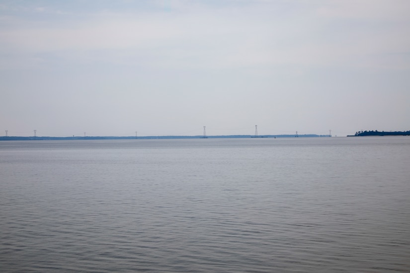 This photo is a view of the Skiffes Creek power lines from the Colonial Parkway at  37°13'10.75"N;  76°41'55.54"W. A 70mm focal length was used, as this best matched up what the human eye was seeing and what was being viewed through the viewfinder of a full frame camera.