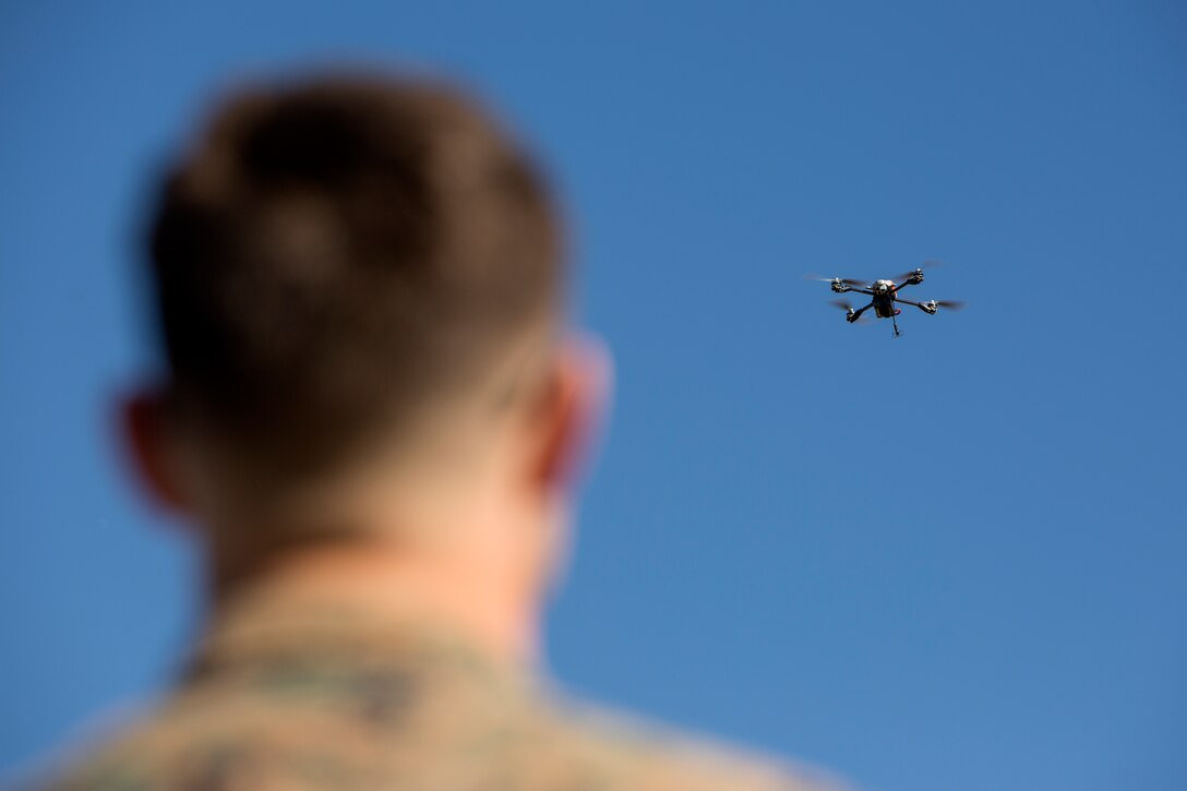 A U.S. Marine with 2nd Marine Division, flys a Instant Eye drone system during Small Unmanned Aircraft System (SUAS) training on Camp Lejeune, N.C., Feb. 5, 2019. The training provided Marines across the 2nd Marine Division an opportunity to conduct live flights, increase familiarity, and proficiency with SUAS. (U.S. Marine Corps photo by Cpl. Melanye Martinez)