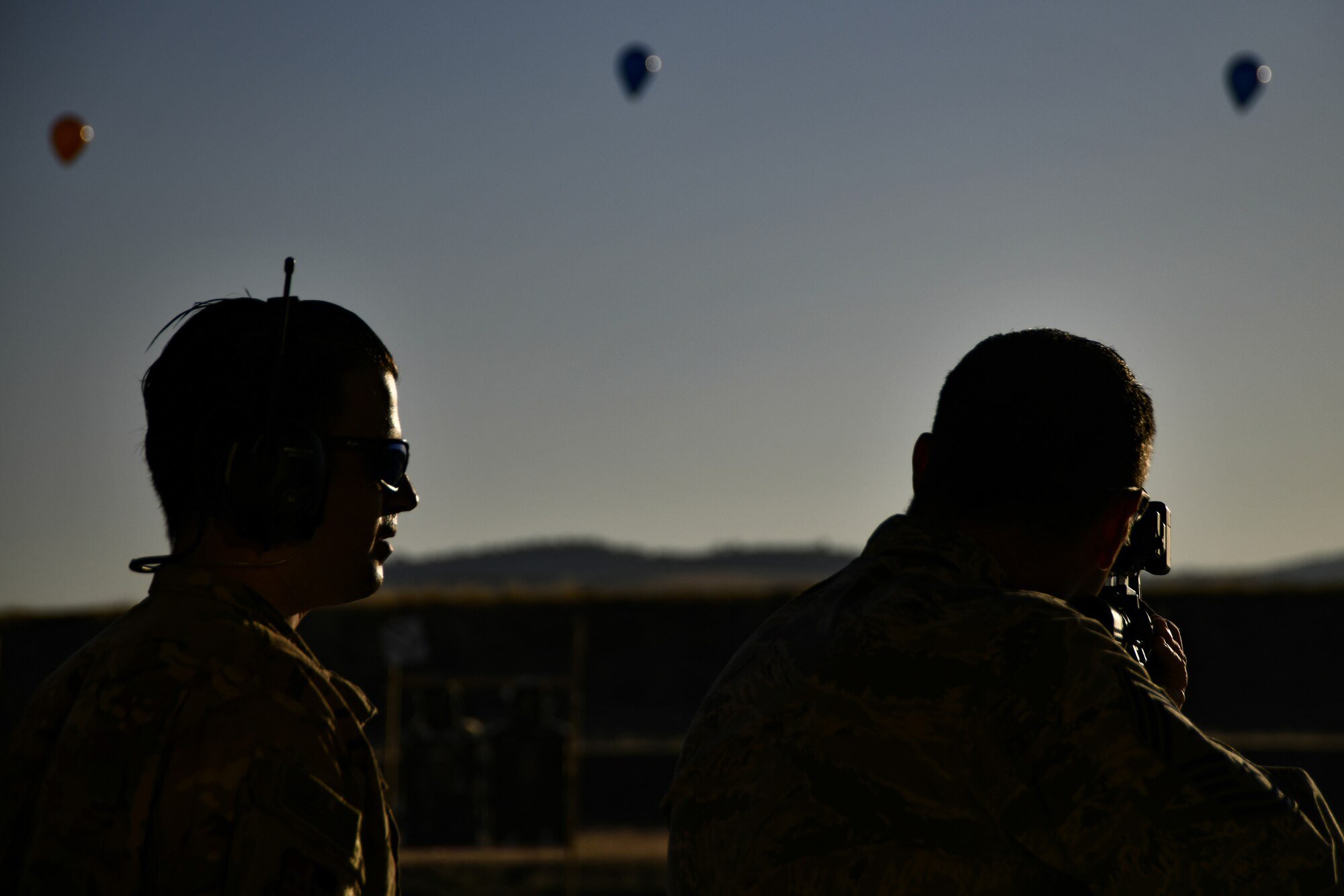 Chief Master Sgt. Dustin Hall, 9th Reconnaissance Wing command chief, receives instruction on how to use the Smart Shooter sighting device from Staff Sgt. Colton Becker, 9th Security Forces Squadron training flight, during a demonstration at Beale Air Force Base, California, Aug. 14, 2019. The 9th SFS Airmen have been using off the shelf commercial technology to help train and improve how their missions are conducted to protect the installation and the Beale AFB mission. (U.S. Air Force photo by Tech. Sgt. Alexandre Montes)