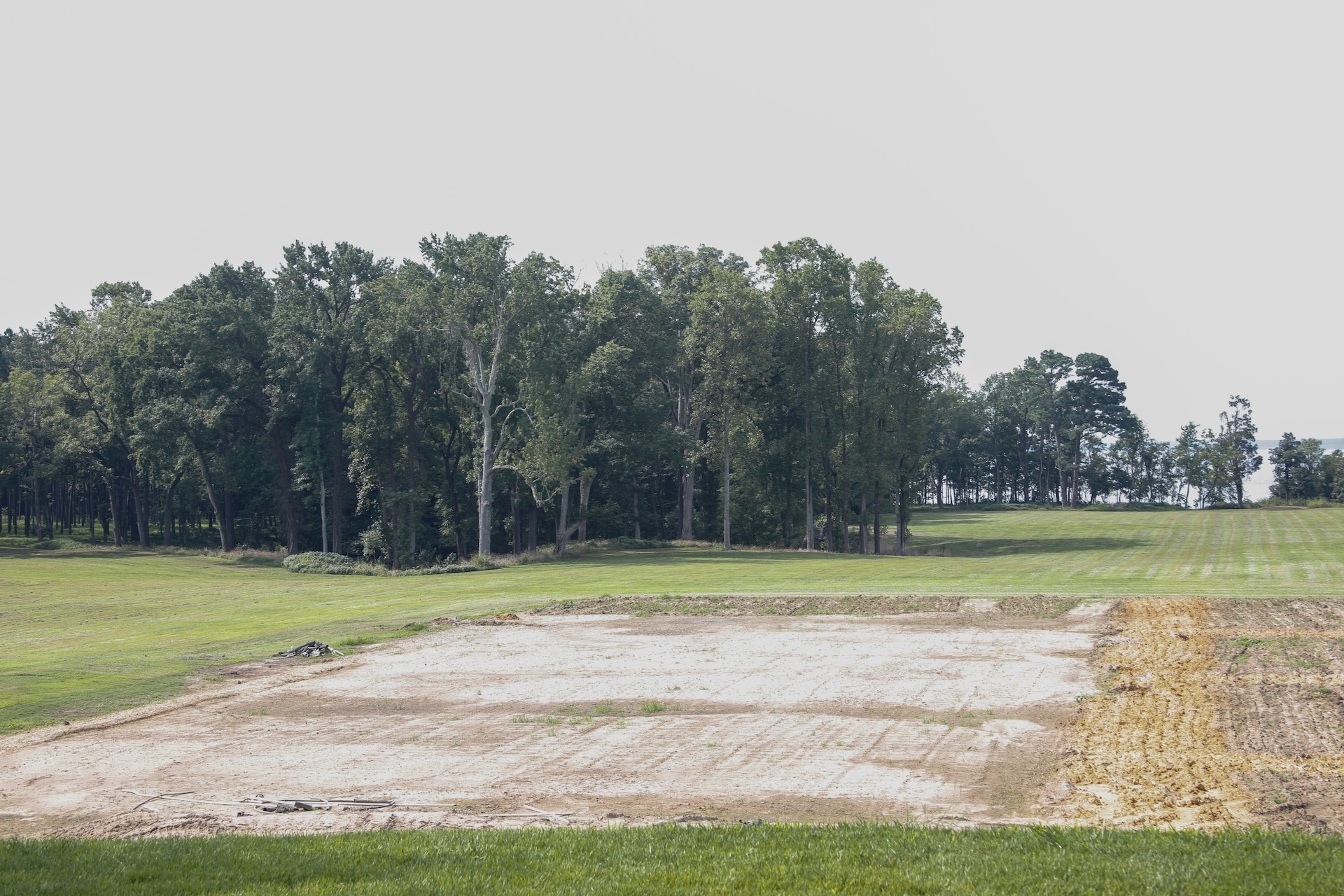 This photograph was taken from the middle of the back patio of the Carters Grove Plantation at   37°12'24.64"N;   76°37'29.51"W. A 70mm focal length was used as this best matched up the size of the towers through the viewfinder on a full frame camera with what the human eye was seeing at the location.