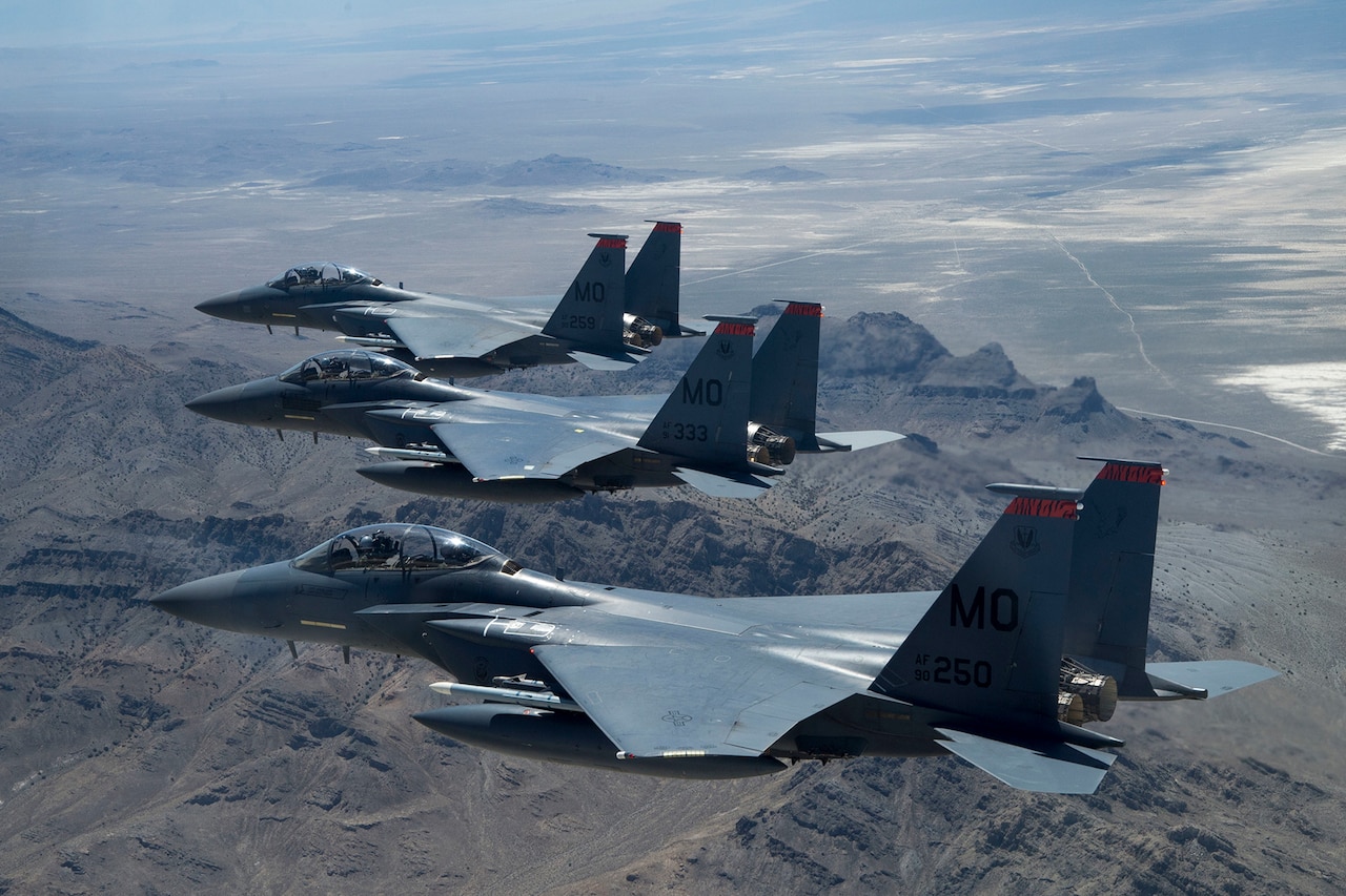 Three aircraft fly in formation.