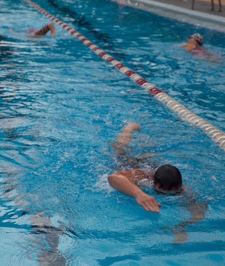 Participants swim during the Marine Corps Community Services’ 20th Annual Sprint Triathlon at the Hancock pool, Marine Corps Air Station Cherry Point, North Carolina, Aug. 17, 2019. The 400-meter swim was the first relay the participants had to accomplish. Athletes braved muggy temperatures and stiff competition in the grueling, but popular event. (U.S. Marine Corps photo by Lance Cpl. Alexandra Santos Arambulo)
