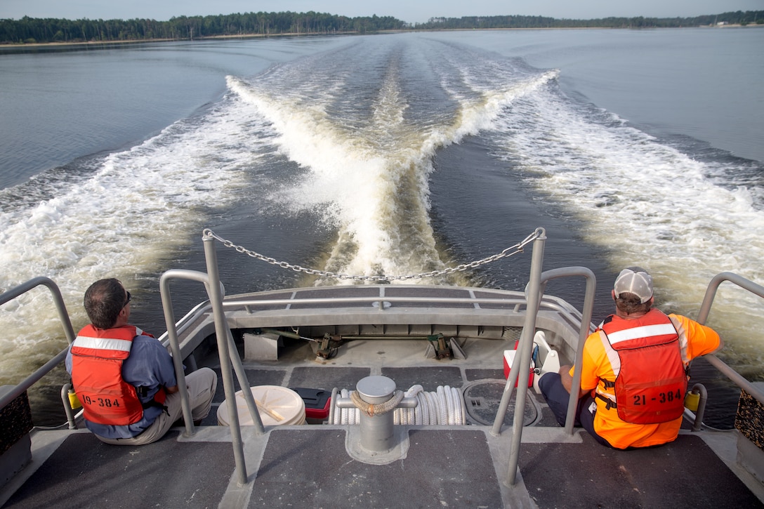 James Carter, left, and Rodney George, both with the city of Havelock’s Waste Water Treatment Plant, are escorted out to water quality testing sites by Sailors assigned to the Navy Boat Docks at Marine Corps Air Station (MCAS) Cherry Point, North Carolina, June 27, 2019. Tracking changes in water quality is important to maintaining the health and livelihood of Marines and Sailors on base as well as civilians in the local area, who depend on clean, reliable water sources. Water quality checks are done once every week to test the chemical, physical, and biological characteristics of the surrounding surface waters to ensure they are safe and abide by regulations upheld by the MCAS Cherry Point Environmental Affairs Department. (U.S. Marine Corps photo by Cpl. Micha Pierce)