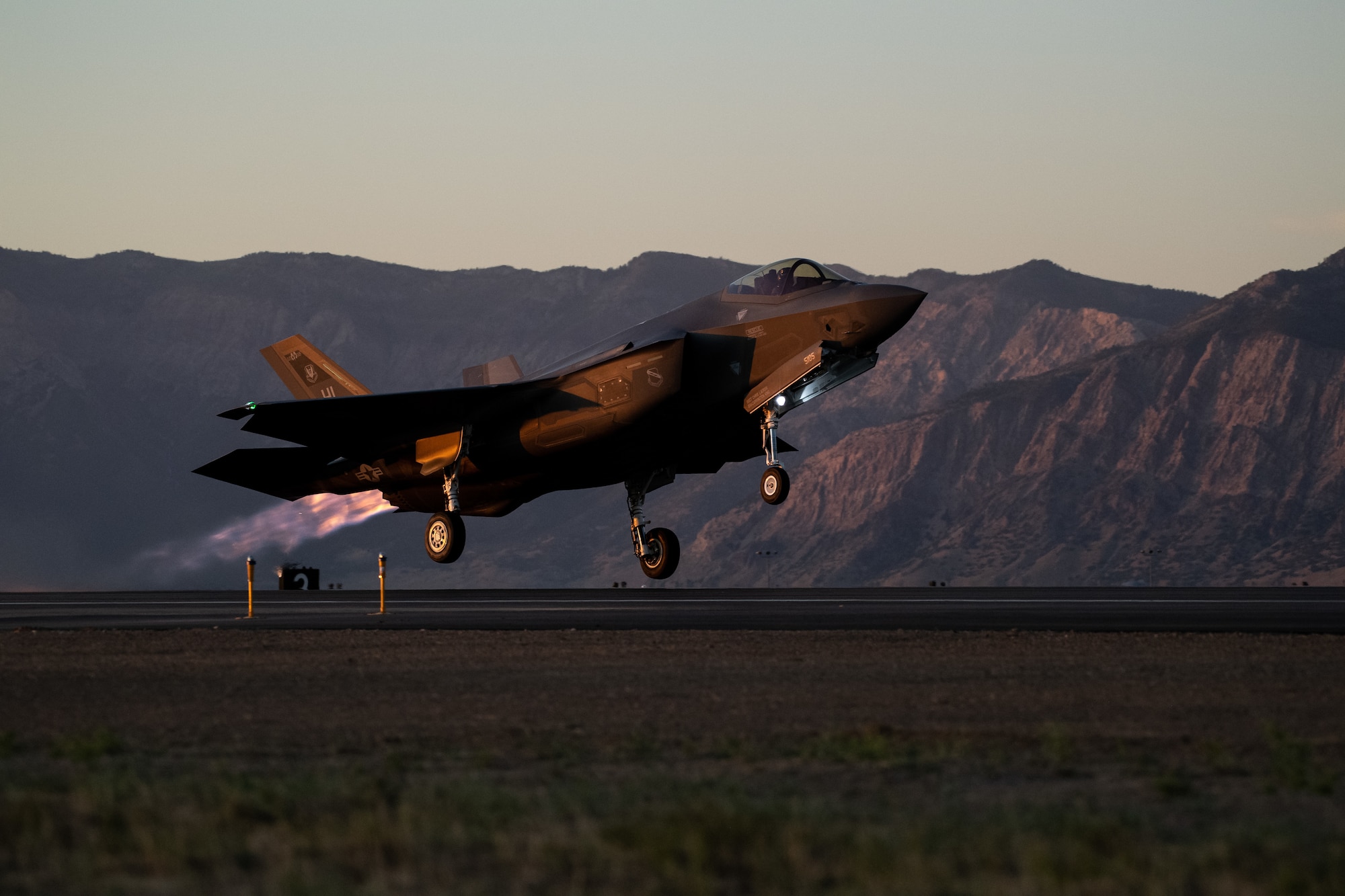An F-35A lifts off from Hill Air Force Base, Utah, the evening of Aug. 20, 2019, as the active duty 388th and reserve 419th Fighter Wings conducted local night flying operations. The wings are required to train at night to maintain their readiness and all-weather capabilities. Increased flying also provides a valuable opportunity to evaluate aircraft maintenance resiliency and operational agility. (U.S. Air Force photo by R. Nial Bradshaw)