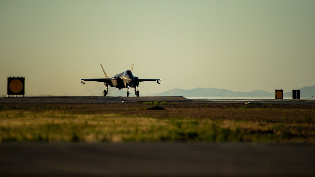 An F-35A sits at the end of the runway prior to take off from Hill Air Force Base, Utah, the evening of Aug. 20, 2019, as the active duty 388th and reserve 419th Fighter Wings conducted local night flying operations. The wings are required to train at night to maintain their readiness and all-weather capabilities. Increased flying also provides a valuable opportunity to evaluate aircraft maintenance resiliency and operational agility. (U.S. Air Force photo by R. Nial Bradshaw)