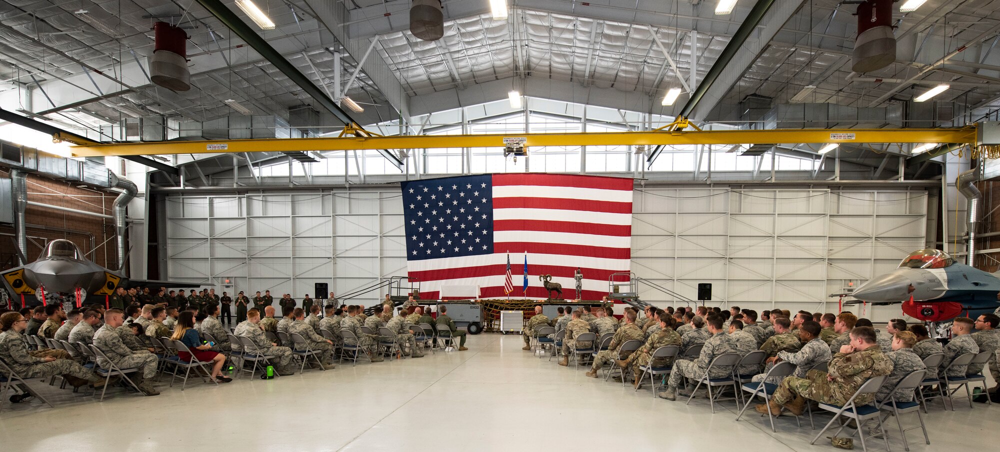 The 57th Maintenance Group held a dedicated crew chief (DCC) induction ceremony at Nellis Air Force Base, Nevada, Aug. 16, 2019. DCC induction ceremonies honor Senior Airmen and Staff Sergeants who have exhibited professionalism, expertise and leadership-traits necessary to take responsibility to an assigned aircraft. (U.S. Air Force photo by Senior Airman Miranda A. Loera)