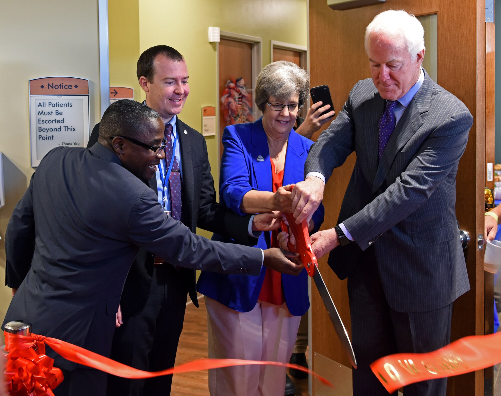 U.S. Senator John Cornyn and officials with Veteran Affairs cut the ribbon to officially open the VA clinic in San Angelo, Texas, August 20, 2019. The new clinic will offer services such as physical therapy, urgent care, and optometry to local veterans. (U.S. Air Force photo by Airman 1st Class Ethan Sherwood/Released)
